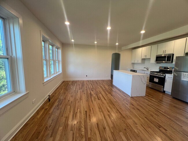 Building Photo - Brand New Renovation! 3 BR/ 2 BA On Quiet ...