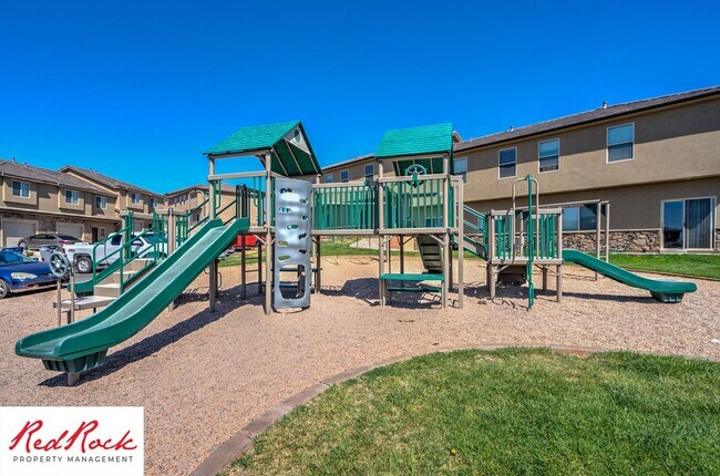 Building Photo - Dog Friendly, Pleasant 4 Bedroom, 2.5 Bathroom Townhome