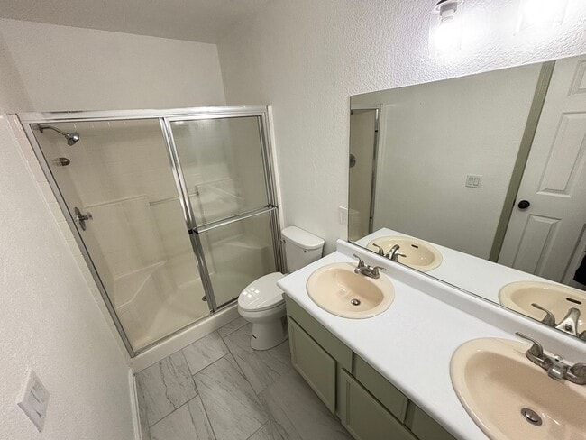 Building Photo - This inviting single-story home boasts a s...