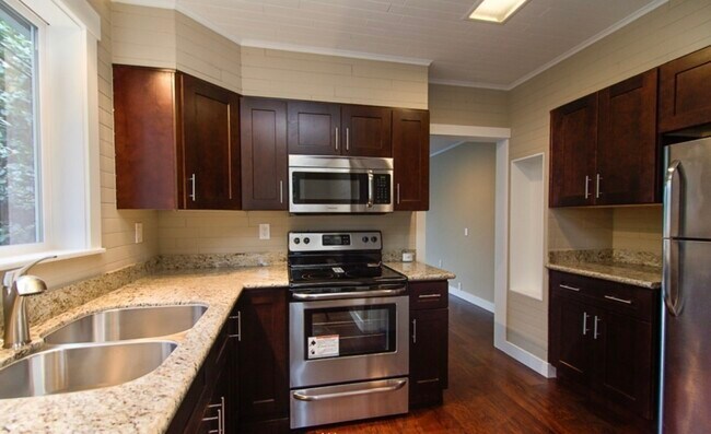 Recently remodeled kitchen. Granite counters, stainless steel appliances. - 110 NE 40th St