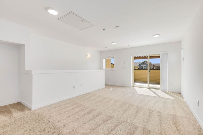 Building Photo - Modern Townhome in Upton at Crossroads Village – Stylish Living in a Prime Location