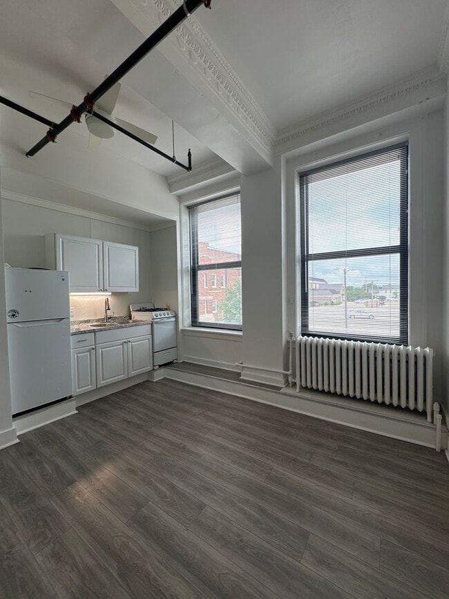 Building Photo - Spacious Loft Style Studio Apt