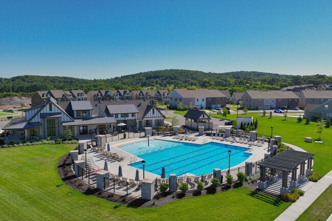 Building Photo - **BE THE LUCKY ONE TO LIVE IN THIS 2024-BUILT END-UNIT TOWNHOME IN A RESORT-STYLE COMMUNITY**