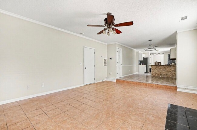 Building Photo - Spacious 5 Bedroom Home with Flexible Living Space & Huge Backyard