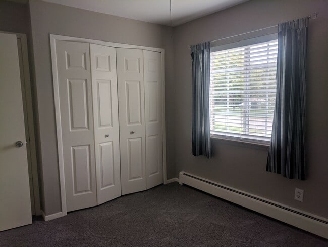 Building Photo - Charming 2-Bedroom Condo – $1,150/month In...