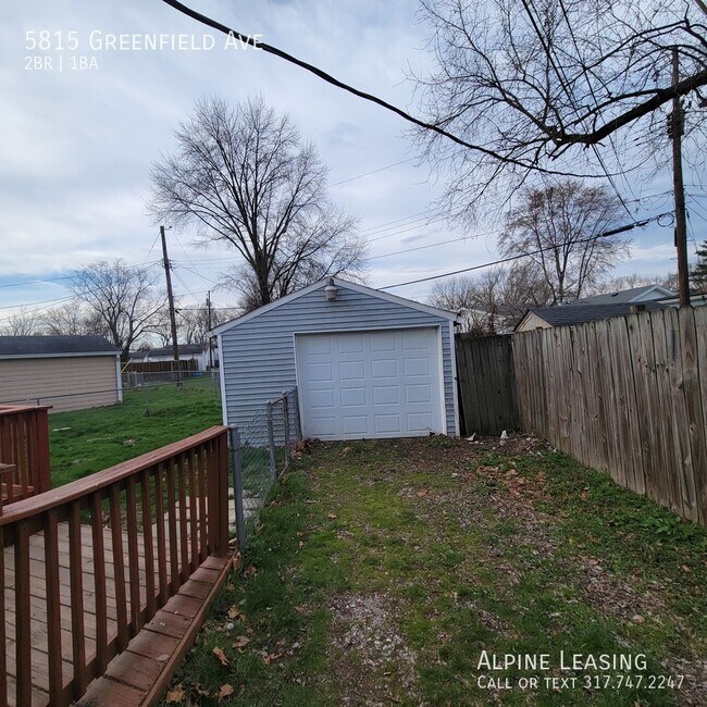 Building Photo - with back deck & garage/workshop combo (ha...
