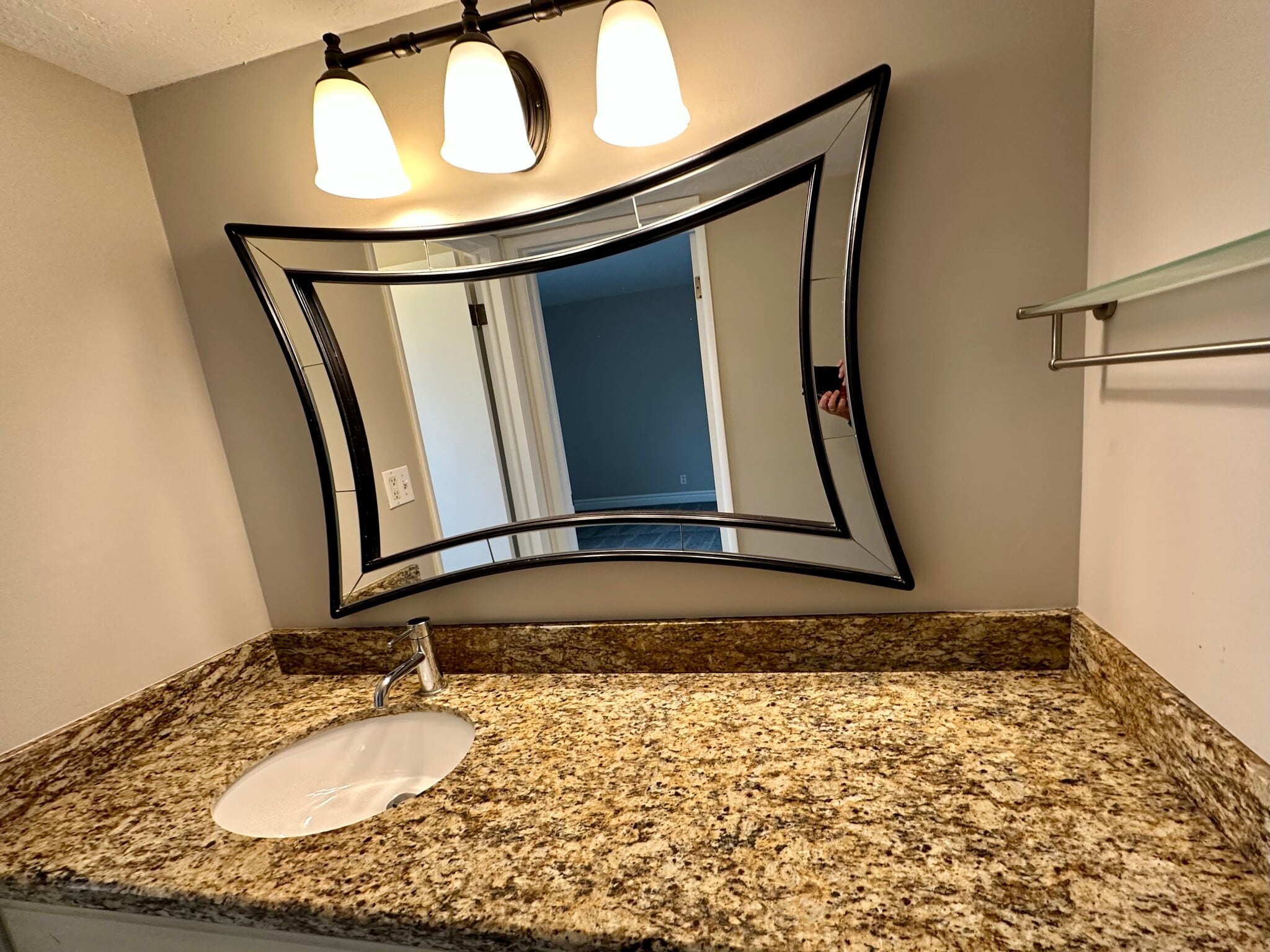 Bathroom vanity area - granite, modern mirror - 73 F St E