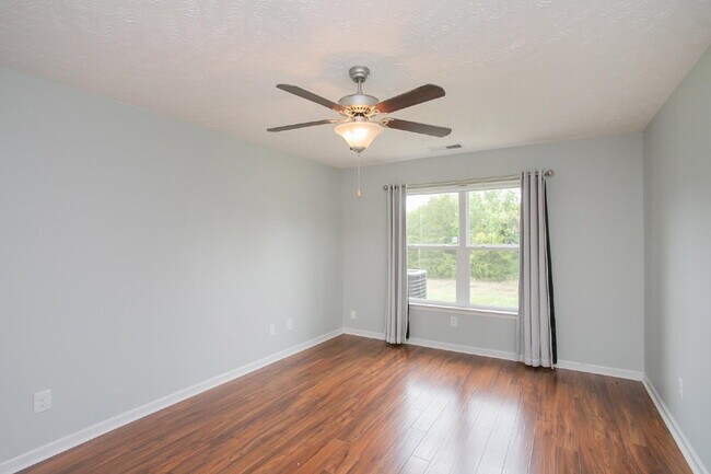 Building Photo - Single-level 2-bed, 2-bath townhome in 55+ community with pool, clubhouse, fitness center and gro...