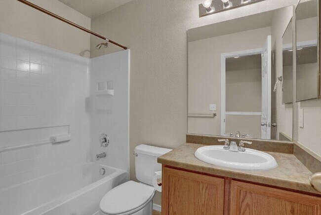 Building Photo - Spacious 3-Bed End-Unit Townhome with Mountain Views Near Ft. Carson