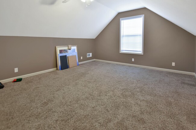 Building Photo - Pet Friendly Three Bedroom with Bonus!