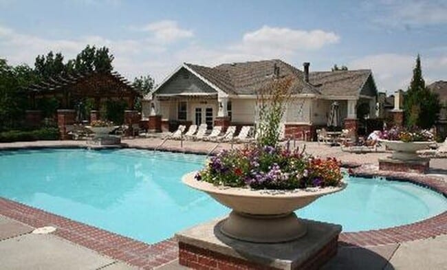 Building Photo - Stunning 3-bed 3-bath townhome that features hardwood floors and an attached 2-car garage!