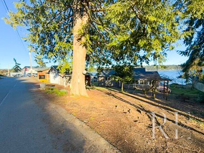 Building Photo - Waterfront Bliss: Stunning Puget Sound Views & Your Own Private Beach!