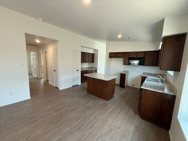 Building Photo - BRAND NEW 4 Bedroom in Desert Sands!