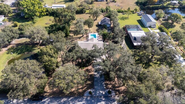 Building Photo - Country-Style Sarasota Living on a Full Acre - Pool Home with Oversized Workshop — Move-In Ready Now