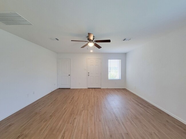 Building Photo - This single-story home has a comfortable layout with three bedrooms and a living area all on one ...