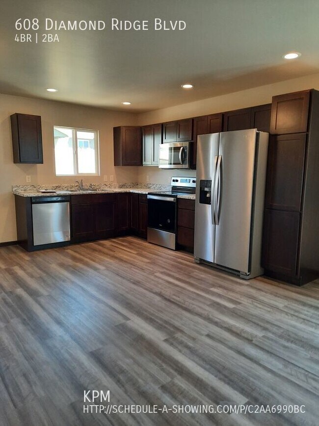 4 BED 2 BATH DOUBLE GARAGE RAPID VALLEY 608 Diamond Ridge Blvd