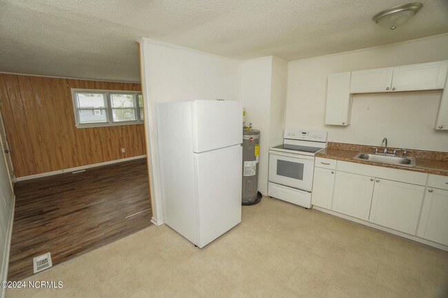 Building Photo - Lawn Care Included in Jville City Limits!