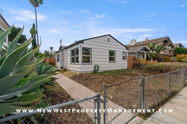 Building Photo - Recently Renovated University Heights 2 Bed 1 Bath with 2 off-street parking spaces! Pet OK!