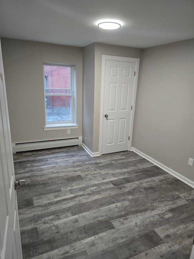 Building Photo - 3 Bedroom 1Bath Newly Renovated Apt- 228 M...