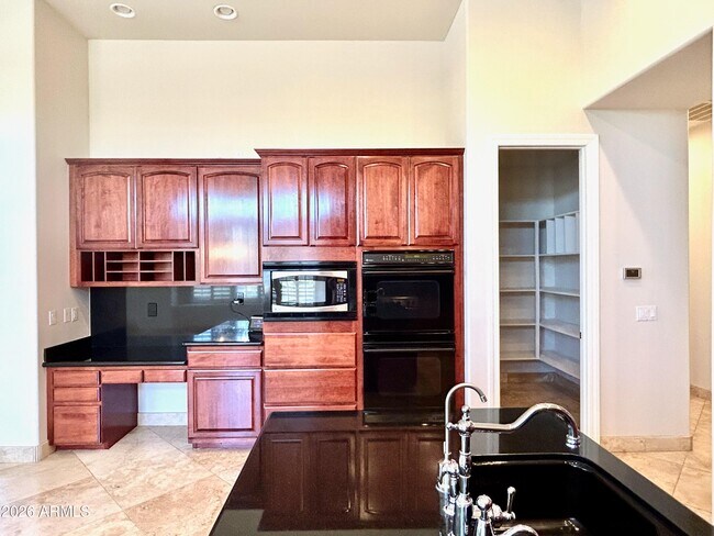 Building Photo - 7484 E Pontebella Dr