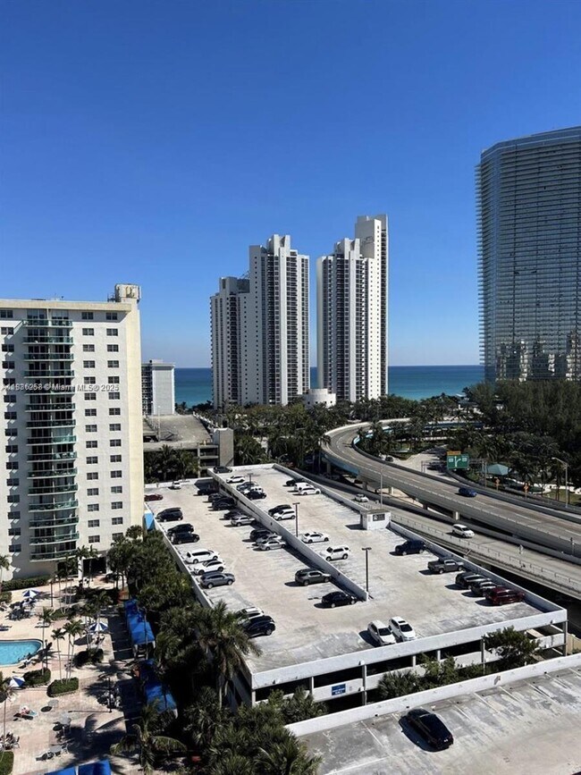 Building Photo - 19380 Collins Ave