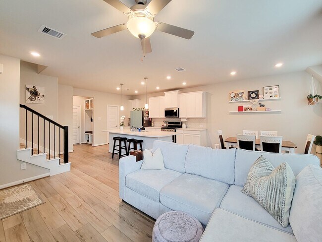 Building Photo - A true gem on a quiet corner lot, this spacious and sun-filled home is tucked away from street no...