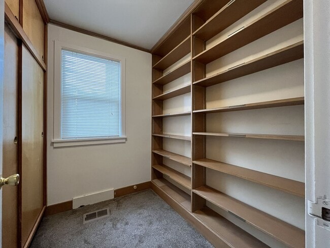 Building Photo - Expansive 4BR 2,900+ Sq Ft Home with Theater-Style Living Room & Bonus Hobby Workshop