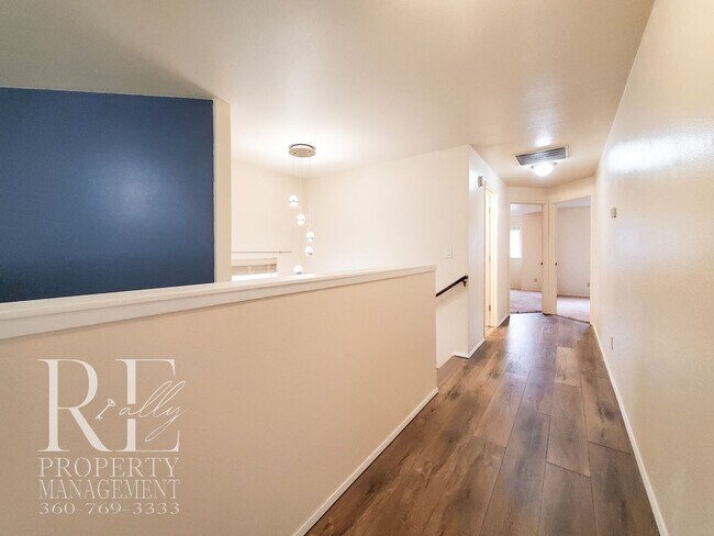 Building Photo - Modernized Two-Story with Open Layout, Gas Fireplace & Large Fenced Yard