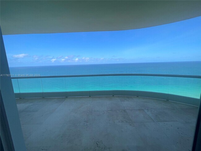 Building Photo - 16047 Collins Ave