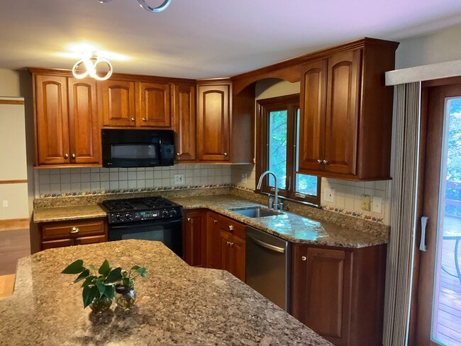 Building Photo - 4-Bedroom Home with 2 Full + 2 Half Baths ...