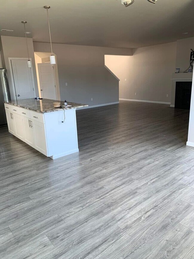 Building Photo - Spacious 4-Bedroom Corner Lot Home with Bonus Room, A/C & Updated Kitchen