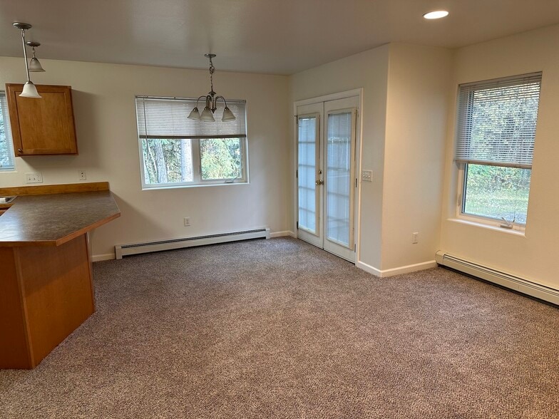 Dining area and doors to deck - 3887 Blessing Ave
