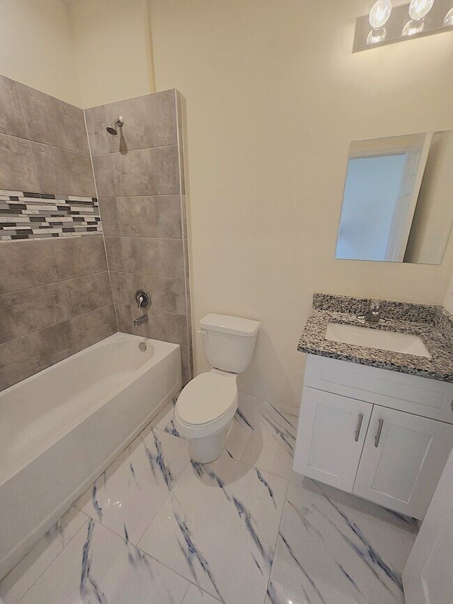 Building Photo - CORNER DULEX-PRIME LOCATION-THREE BEDROOM, TWO BATH, ONE CAR DUPLEX