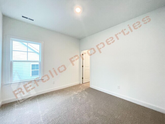 Building Photo - Beautiful Brand New 4 Bedroom, 3 Bathroom Home with 1st Fl Bedroom+  Office, 2-Car-Garage &High-S...