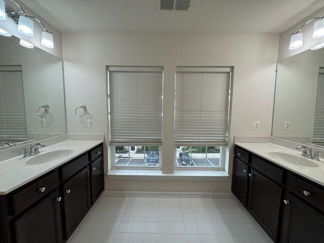 Building Photo - Stylish 3 Bed 3 Bath Townhome With Patio A...