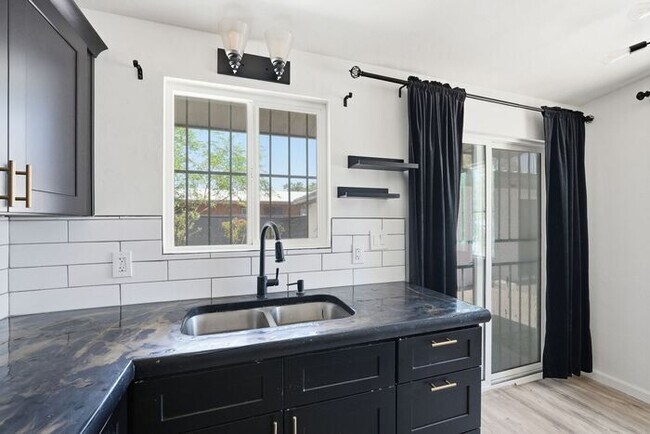 Building Photo - Bright & Airy 2-Bedroom Midtown Tucson Apartment Near TMC & The Loop
