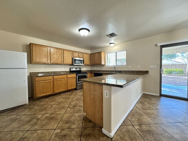 Building Photo - 4 BEDROOM HOME IN TUSCANO