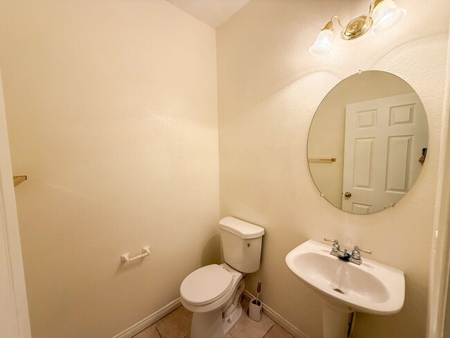 Building Photo - SPACIOUS HOME IN GATED COMMUNITY WITH POOL, RV PARKING & 4-CAR GARAGE!