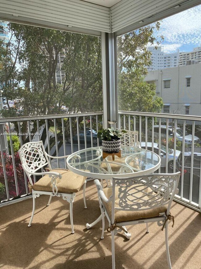 Building Photo - 10150 Collins Ave