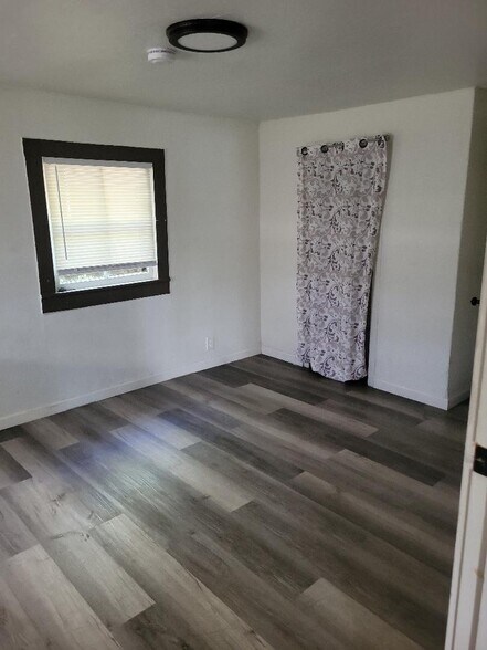 bedroom 1 - 703 N Walnut St