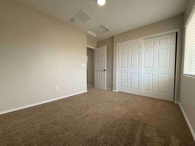 Building Photo - Buckeye, 4 bed, 2.5 bath, huge lot, across...