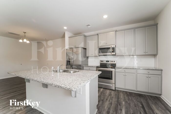 Building Photo - 10714 Rivergate Dr NW