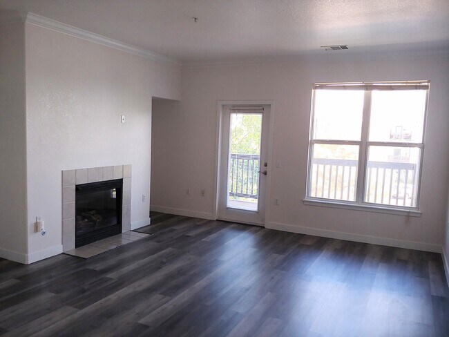 Large Open Living Room with Brand New Plank Flooring - 18989 E Warren Dr