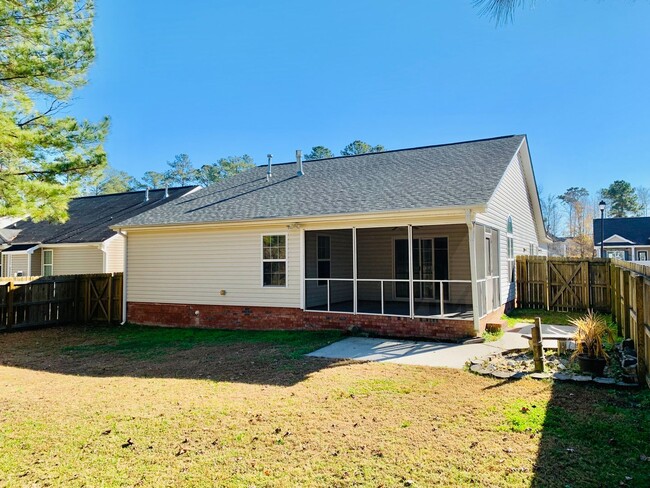 Building Photo - Spacious 3 BR House w/ Fenced Backyard and...