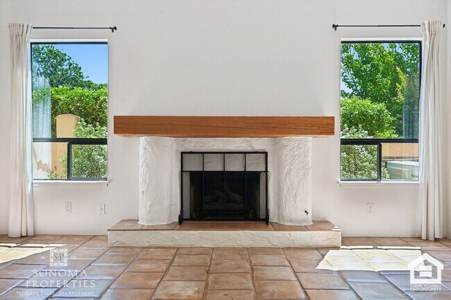 Building Photo - Southwestern Charm Meets Modern Comfort — 2BR/2BA Condo with Access to Shared Pool!