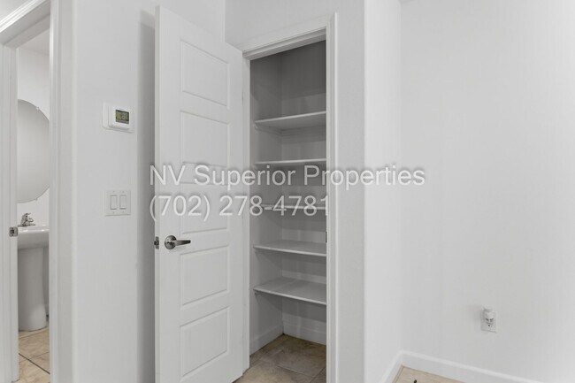 Building Photo - NW! 3 Bedroom Townhouse!! Gated!! Parks!! All Tile Floors Downstairs!! 2 Car Garage!!!