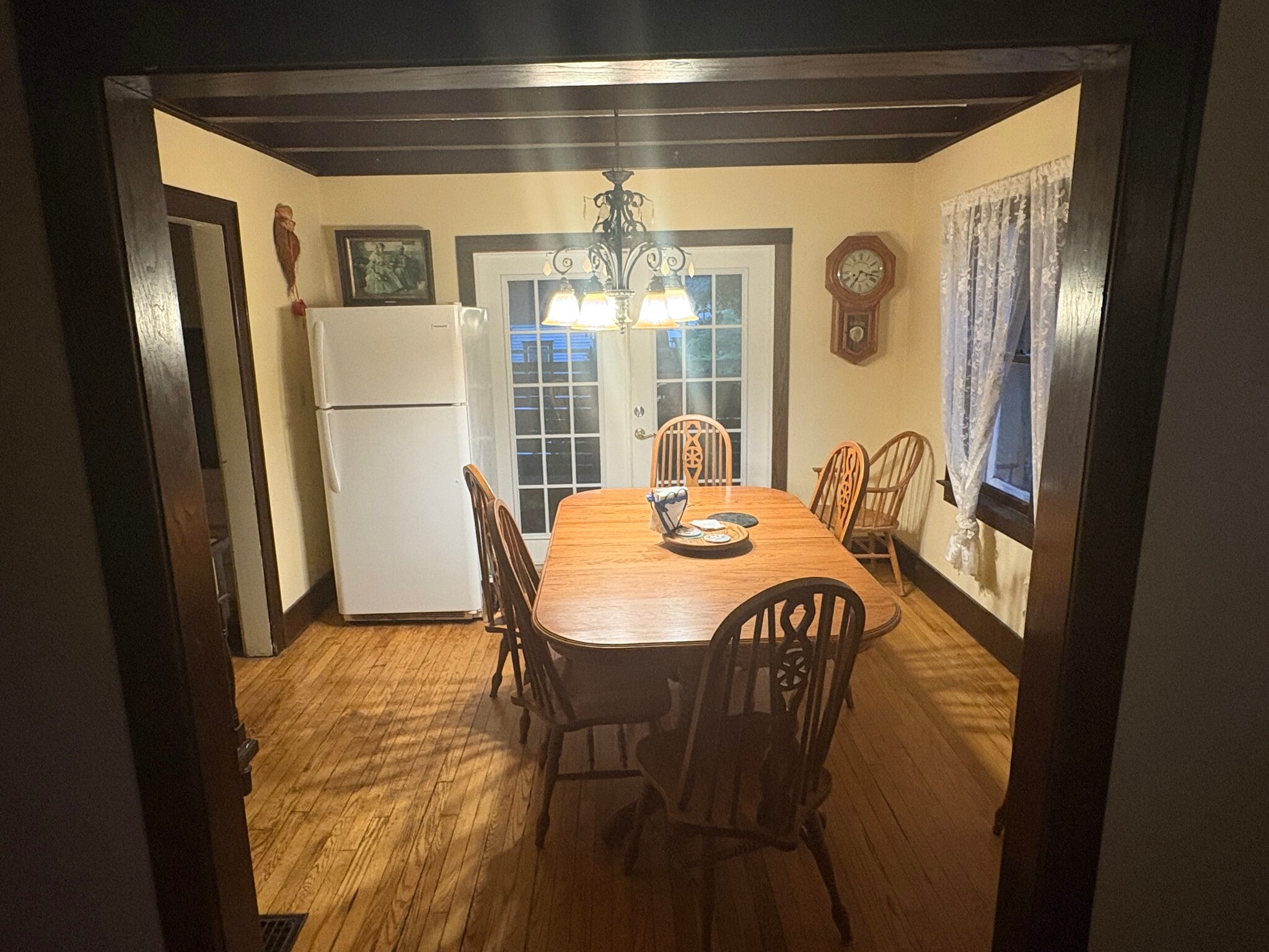 Dining room, French doors to covered porch, second refrigerator - 117 Linden Ave
