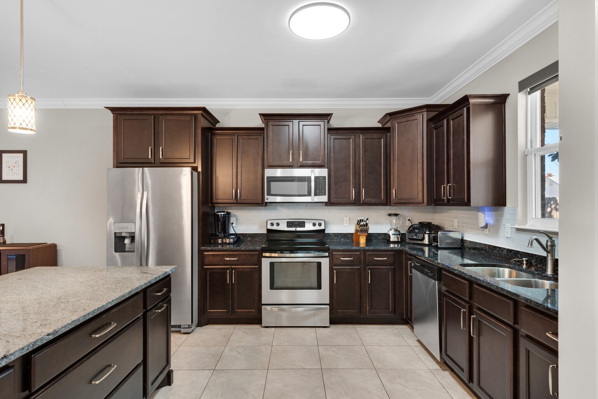 Kitchen has cooking appliances, cookware, utensils, and dishware - 28 Snook Rd