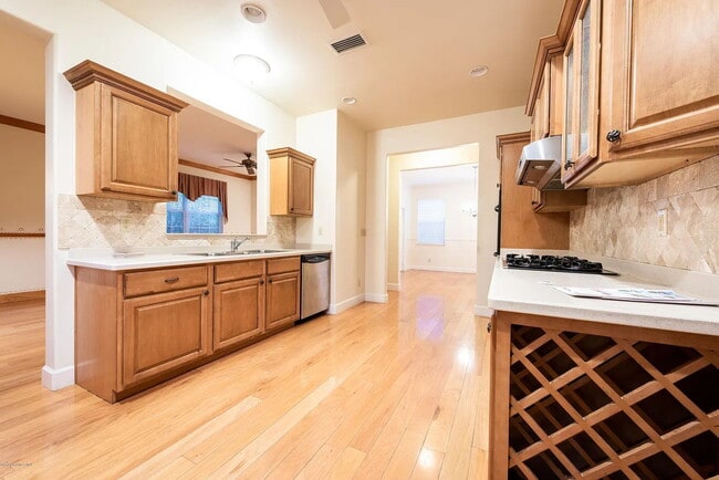 Building Photo - Spacious 4 bedroom house with 2.5 baths in desirable gated LaCita neighborhood