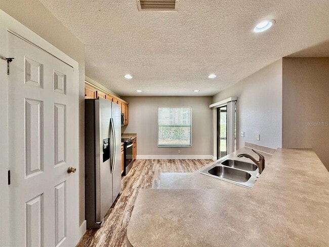 Building Photo - 2409 Hibiscus Bay Ln